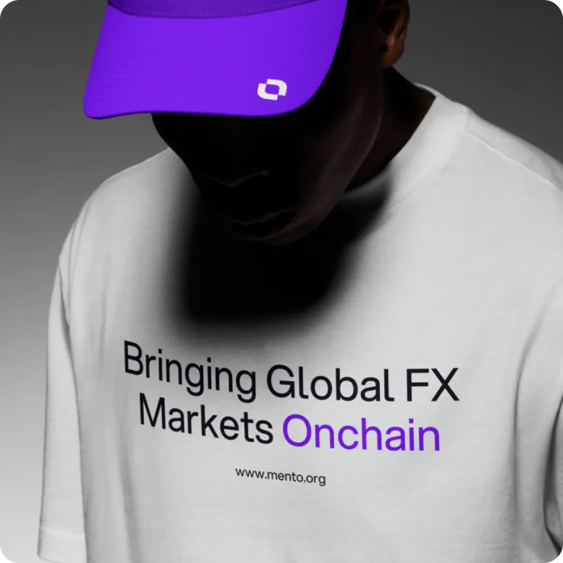 Person wearing a white T-shirt with the text 'Bringing Global FX Markets Onchain' and a purple cap with a white logo.