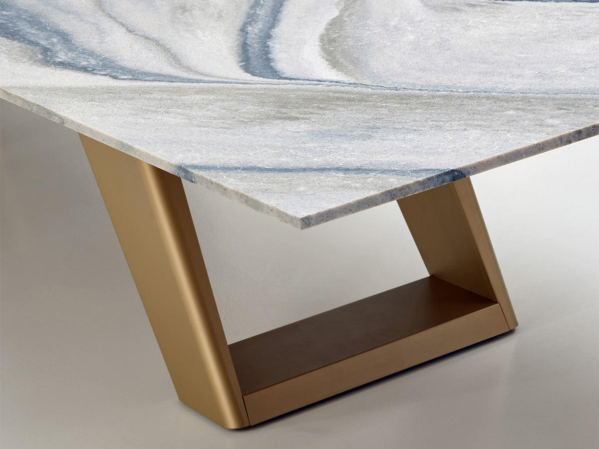 St. Isley quartz on an expanse table with a gold base. 