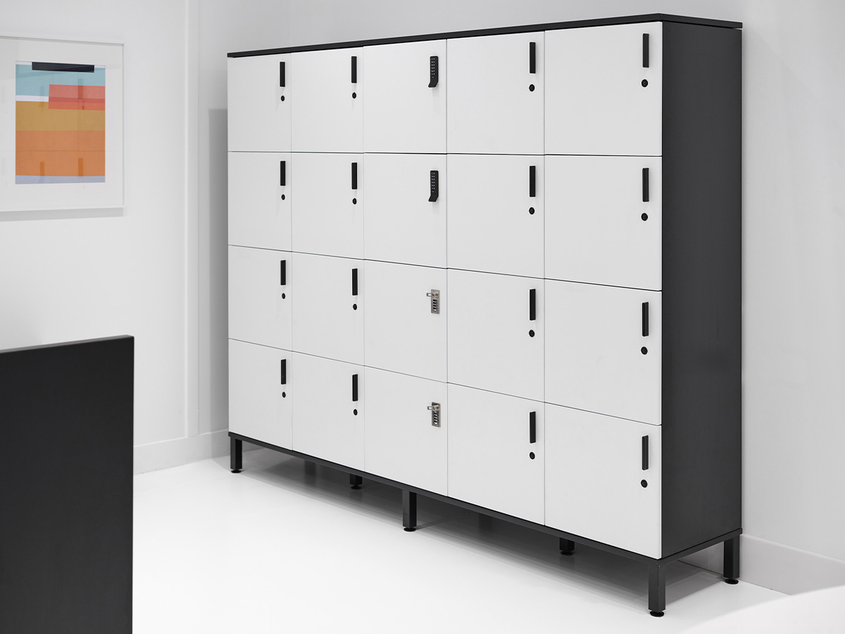 White lockers against a wall. 
