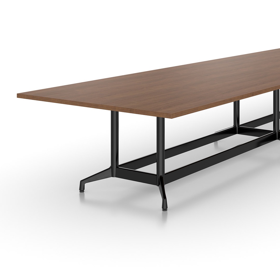 Sensation Next conference table with footer bars on white background.