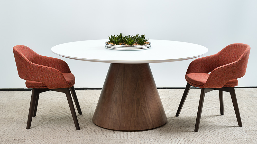 Round table with plants and chairs