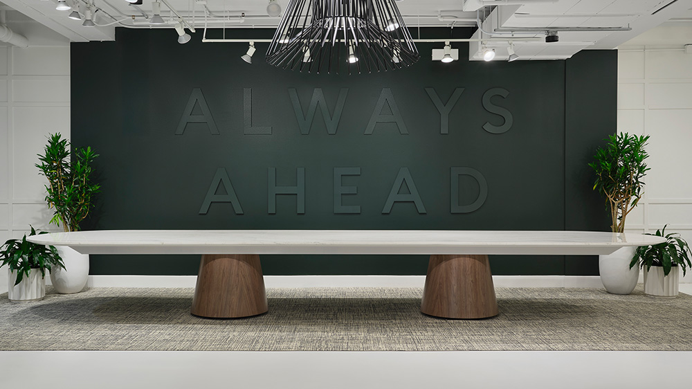 Large table with green wall
