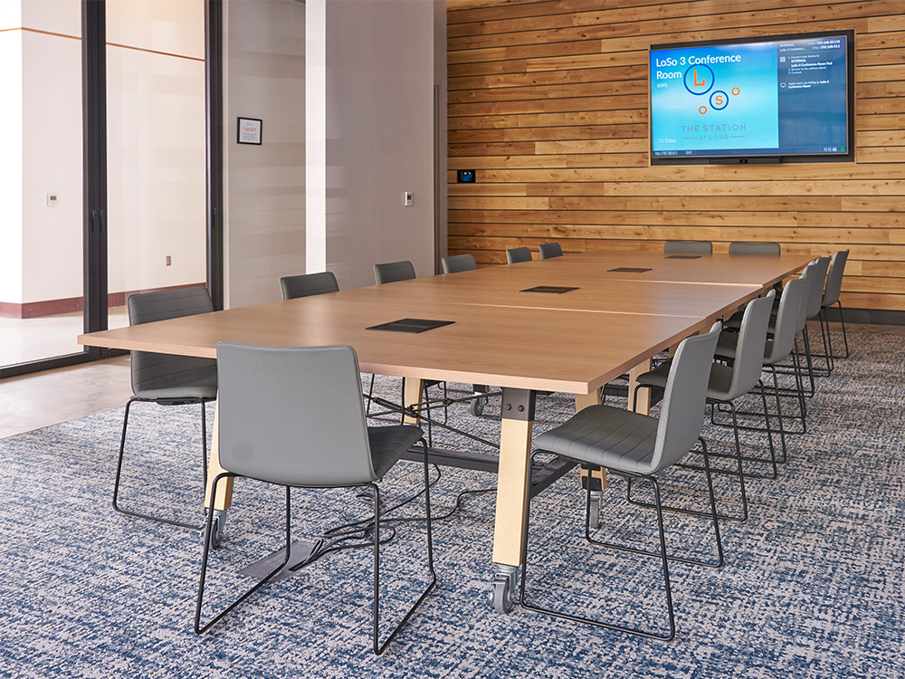 Table with chairs and TV