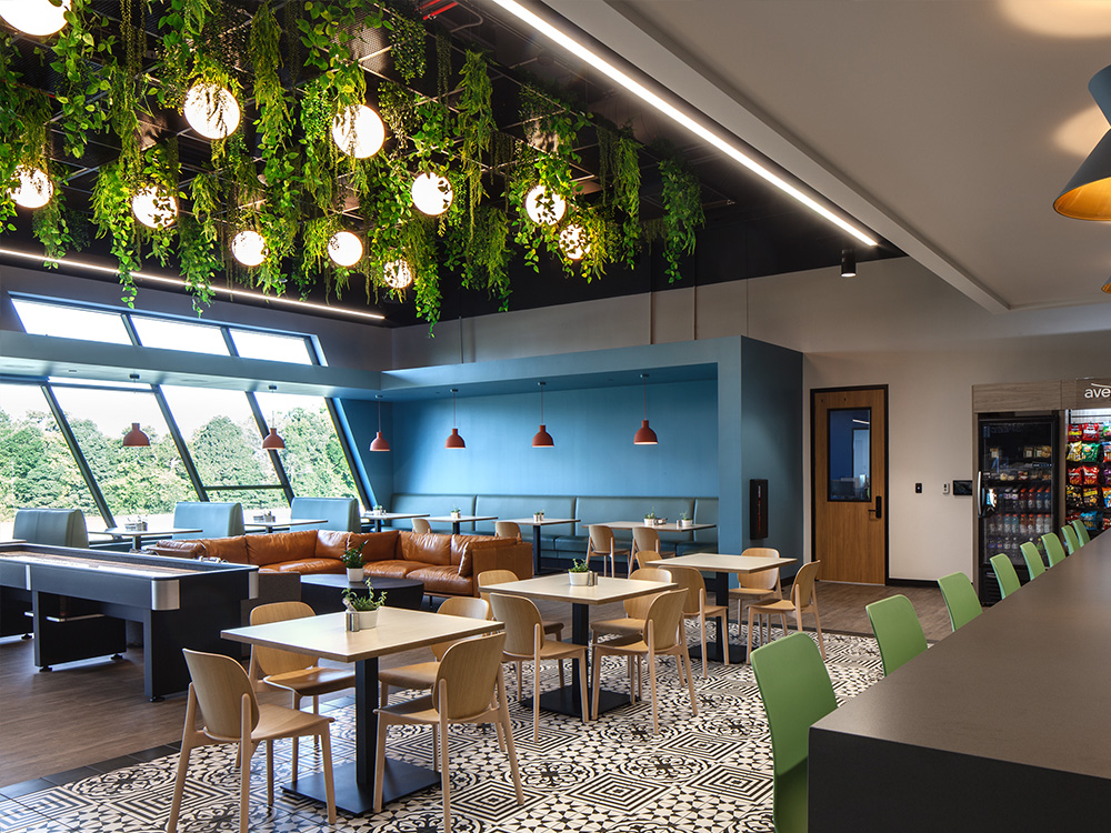 Cafeteria with plants and tables