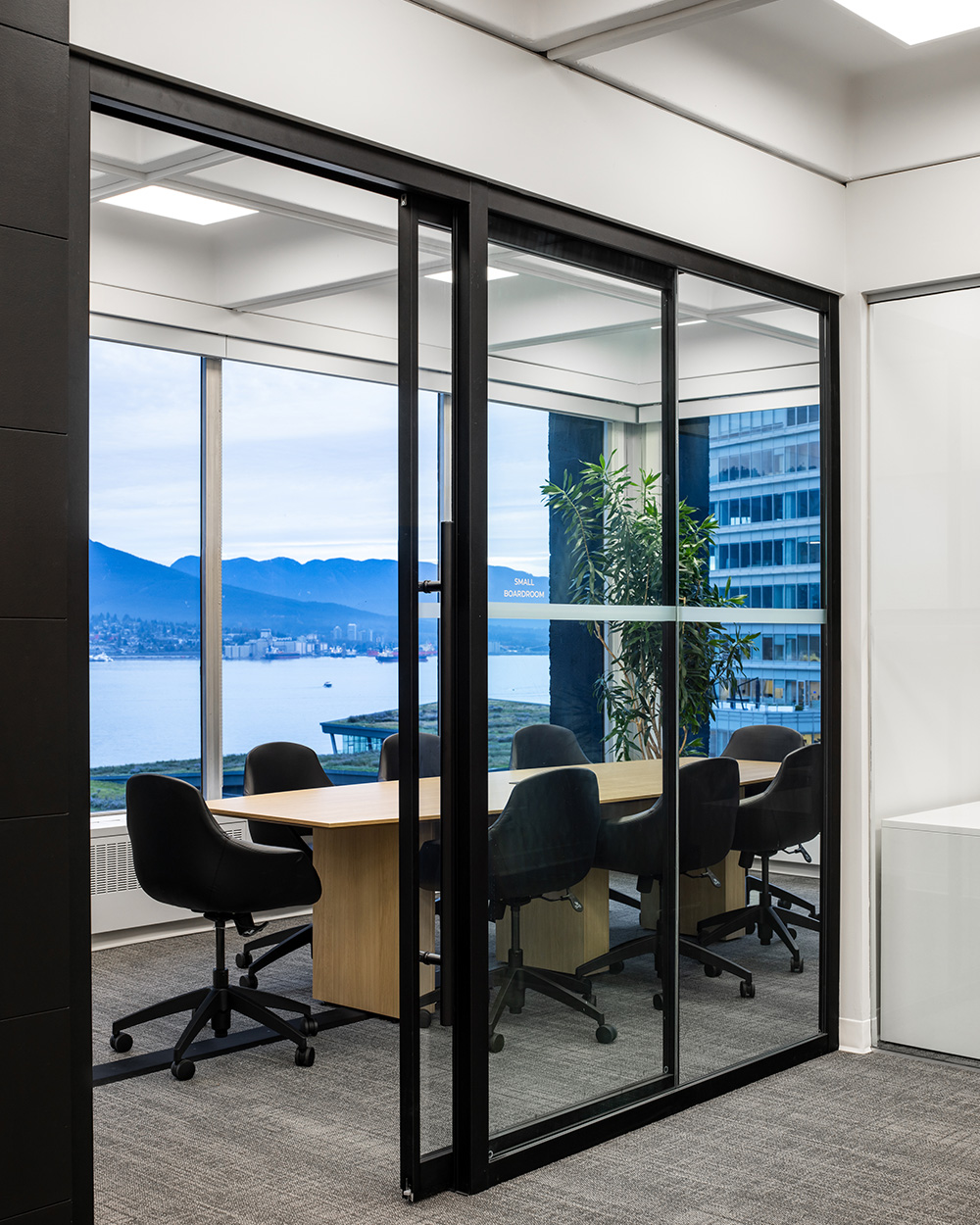 Table in a room with glass windows