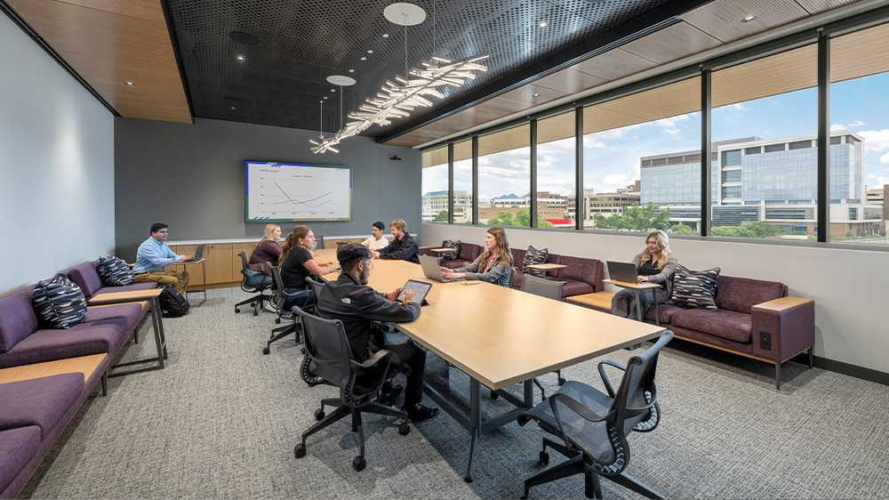 People talking at a large table