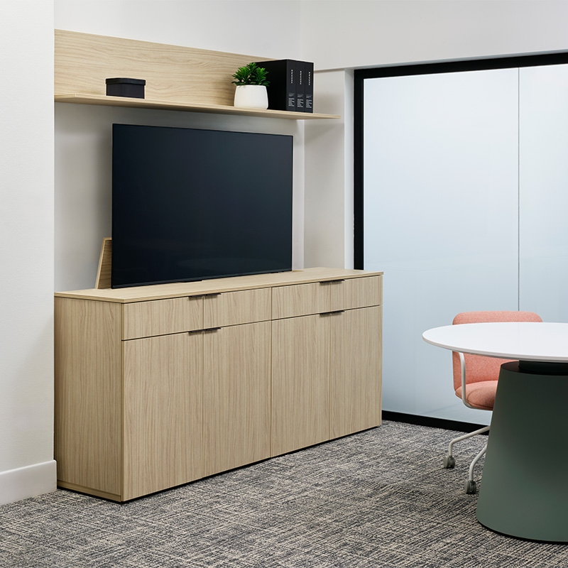 Foundation Monitor Lift Credenza with large TV and shelving above