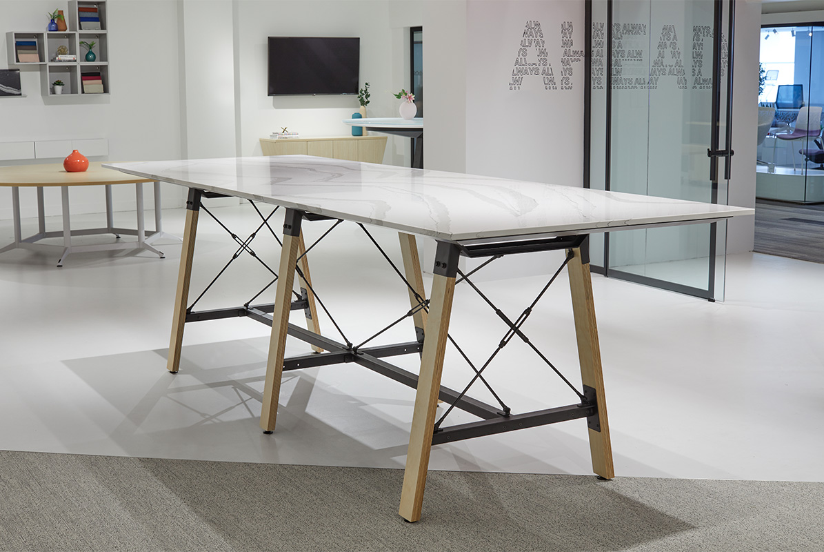 Adventure table that is standing height with quartz.