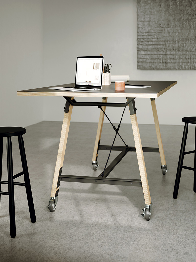 Adventure table with stools and laptop. 
