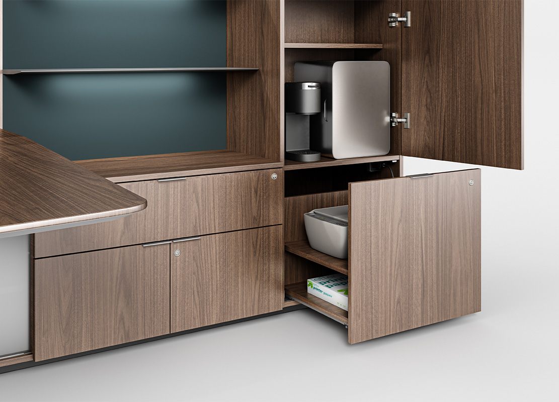 Cabinet showing printer and coffee maker in a Cayman desk. 