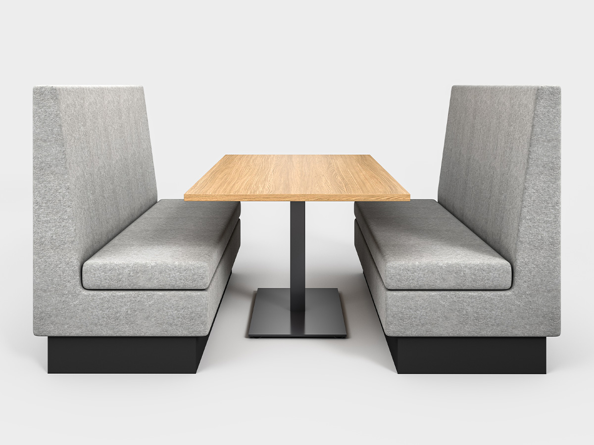 Square base table between two booths. 