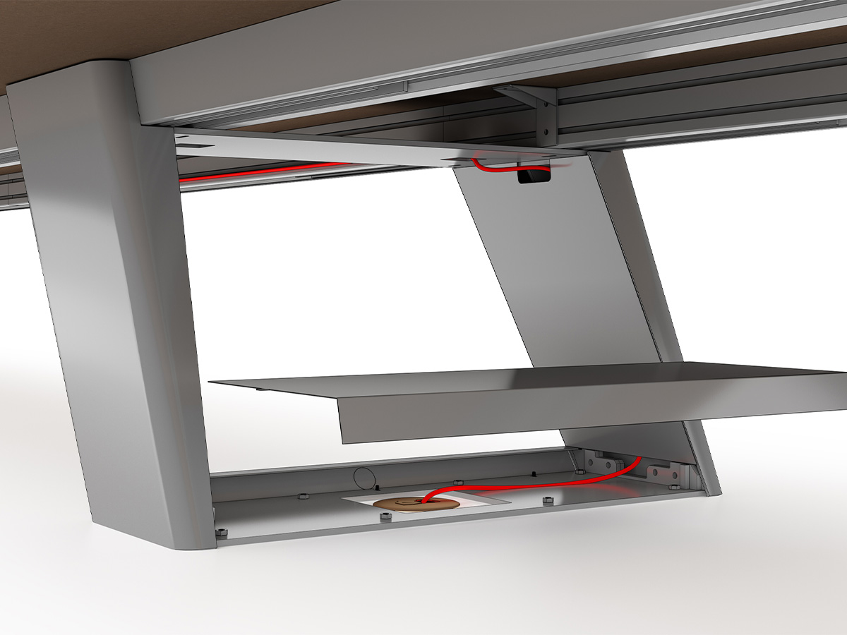 Expanse table with cords routing through the base. 