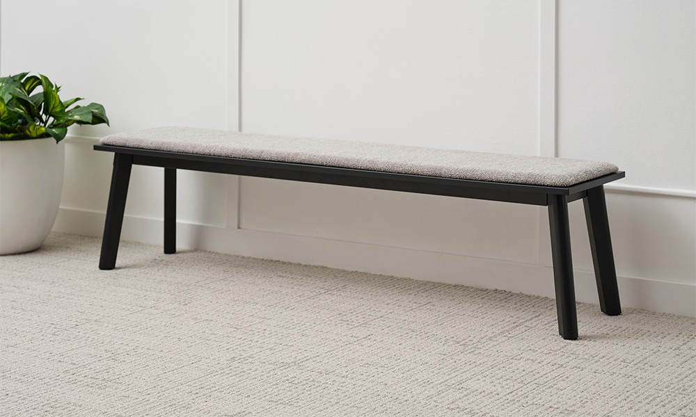 Ligouri Bench against wall with plant