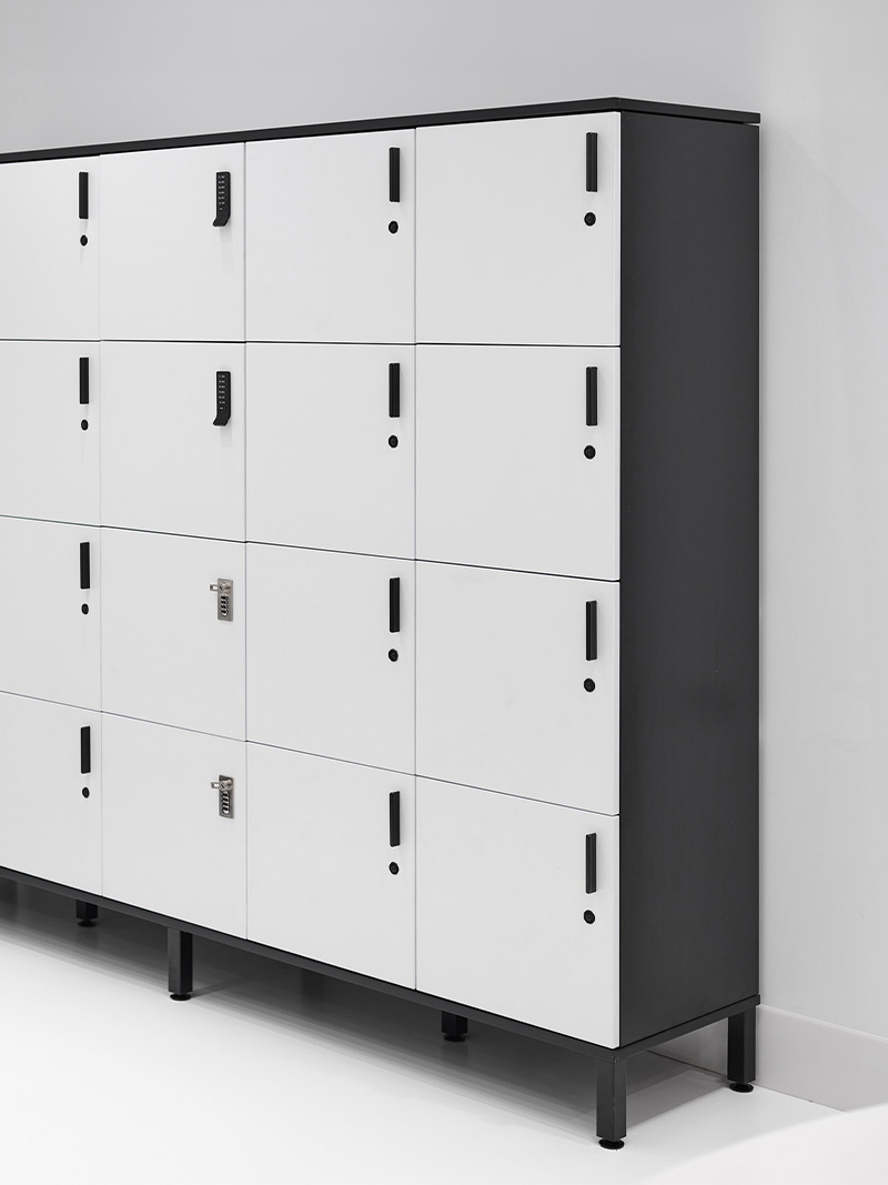 Universal Lockers with white and black laminate against wall