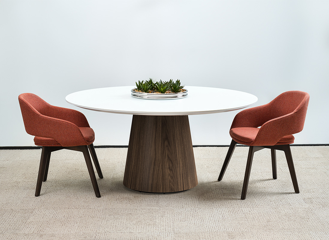 Foundation tapered drum table with two chairs. 