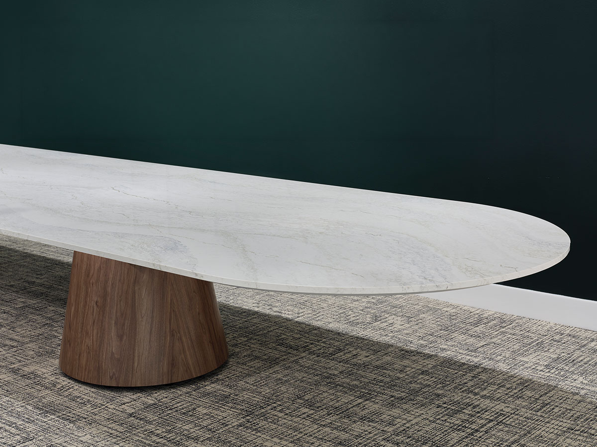 Foundation tapered drum ex table with quartz top. 