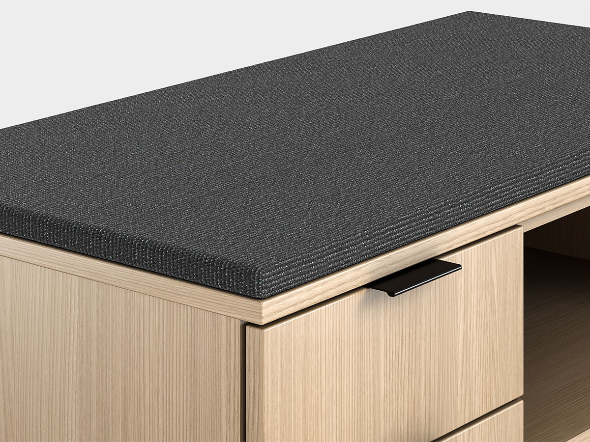 Jet storage with black cushion.