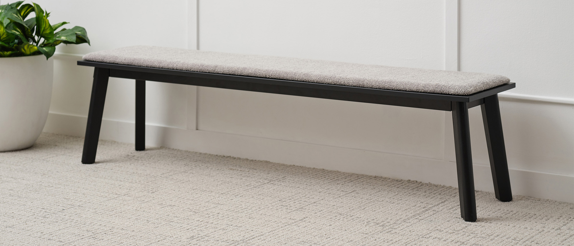 Liguori Bench with cushion against wall