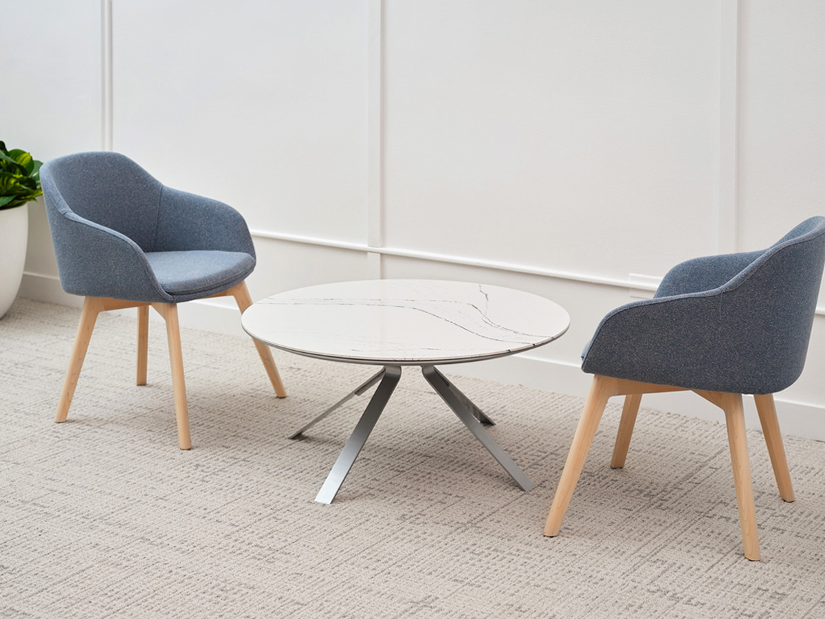 Tangent coffee table in a quiet connection space.