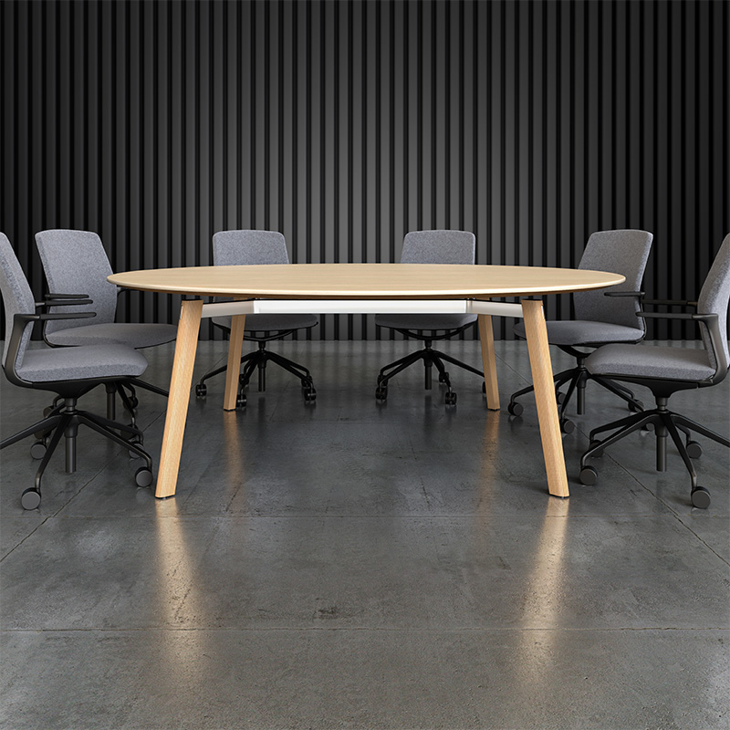 Ligouri round conference table in small meeting space.