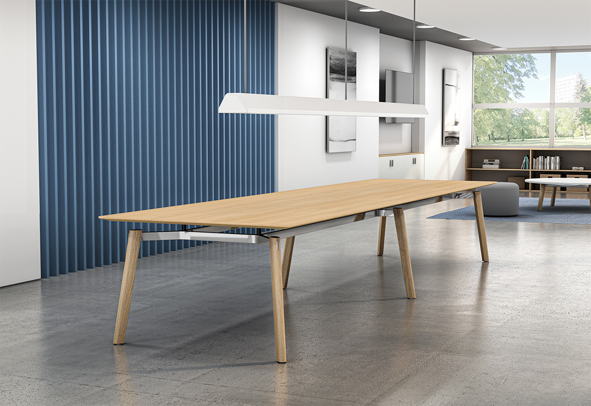 Ligouri conference table with Aged Ash laminate in a touchdown collaborative space.