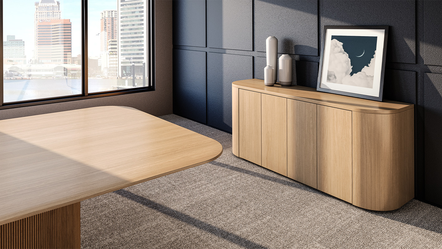Luna credenza and Foundation Drum conference table in meeting space.