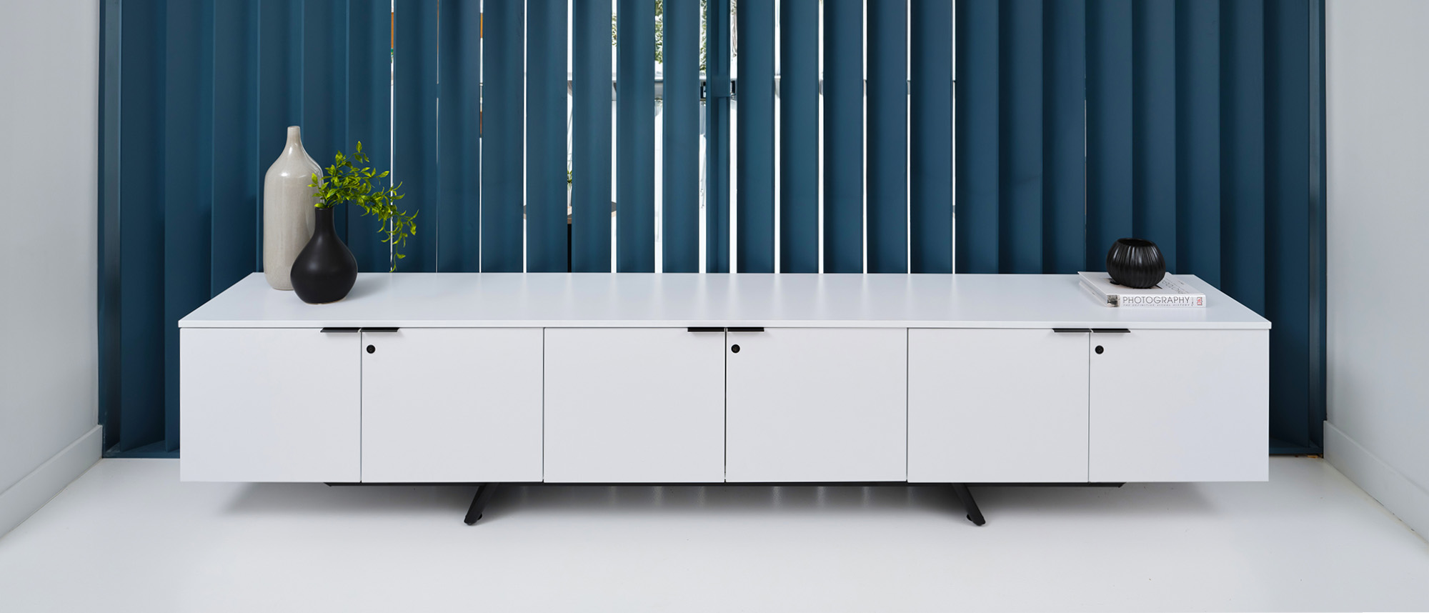 Expanse Credenza against acoustic wall