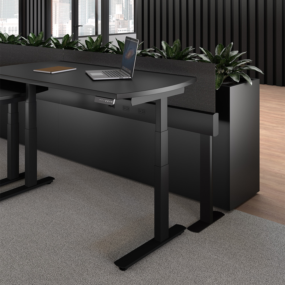 Jet Height-Adjustable Desks against Terra Planter in office space