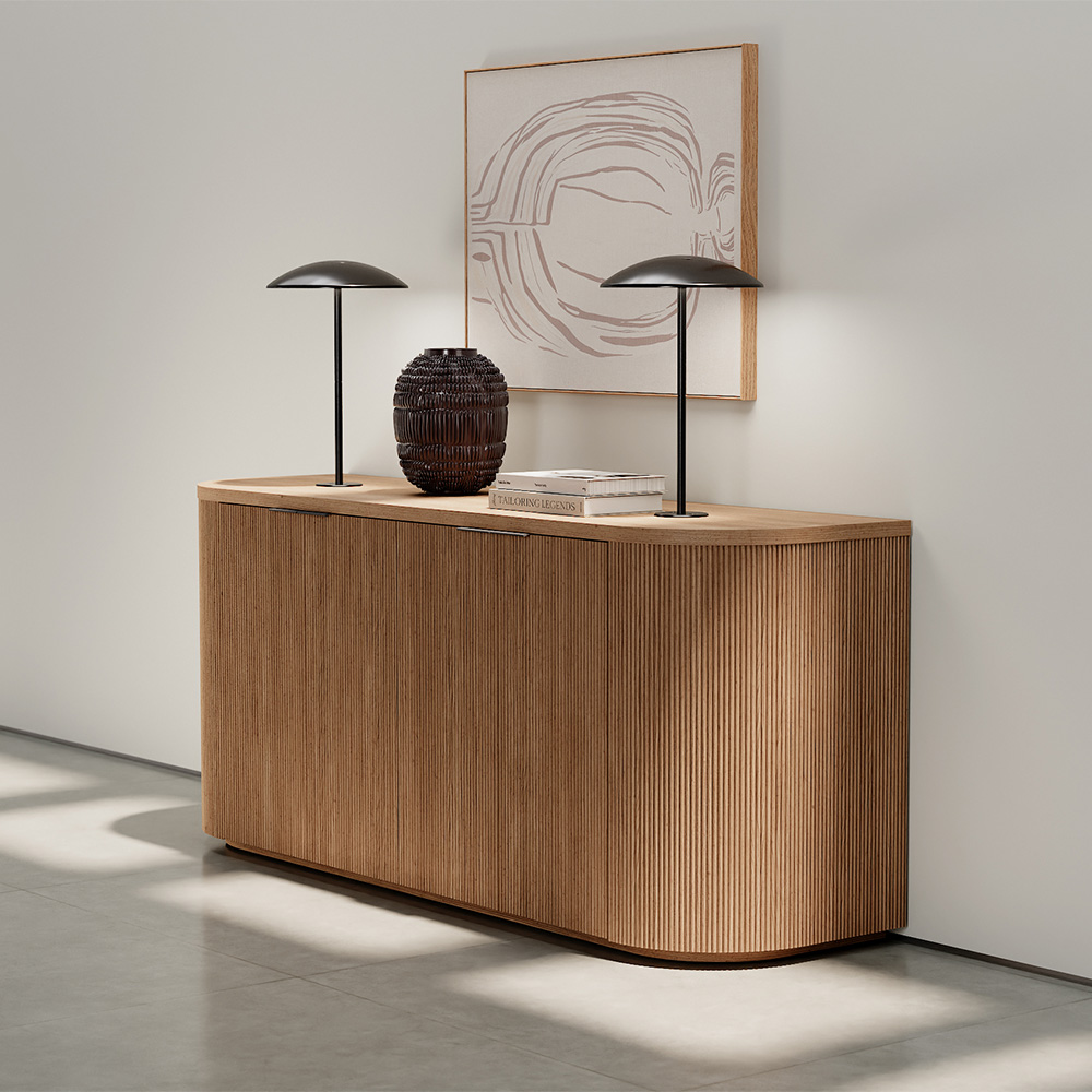 Luna credenza with accent lights against a white wall.