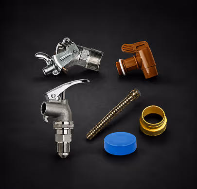 Various metal and plastic plumbing parts including valves, a spring, and a blue cap on black background.