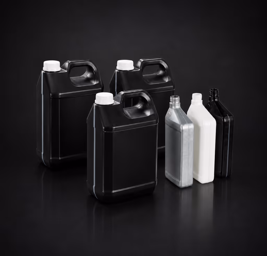 Three black plastic jugs with white caps and three smaller bottles in black, white, and silver without caps.