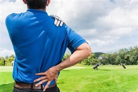 a golfer with some back injury and pain
