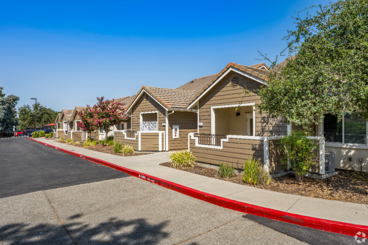 Exterior of homes featuring patios