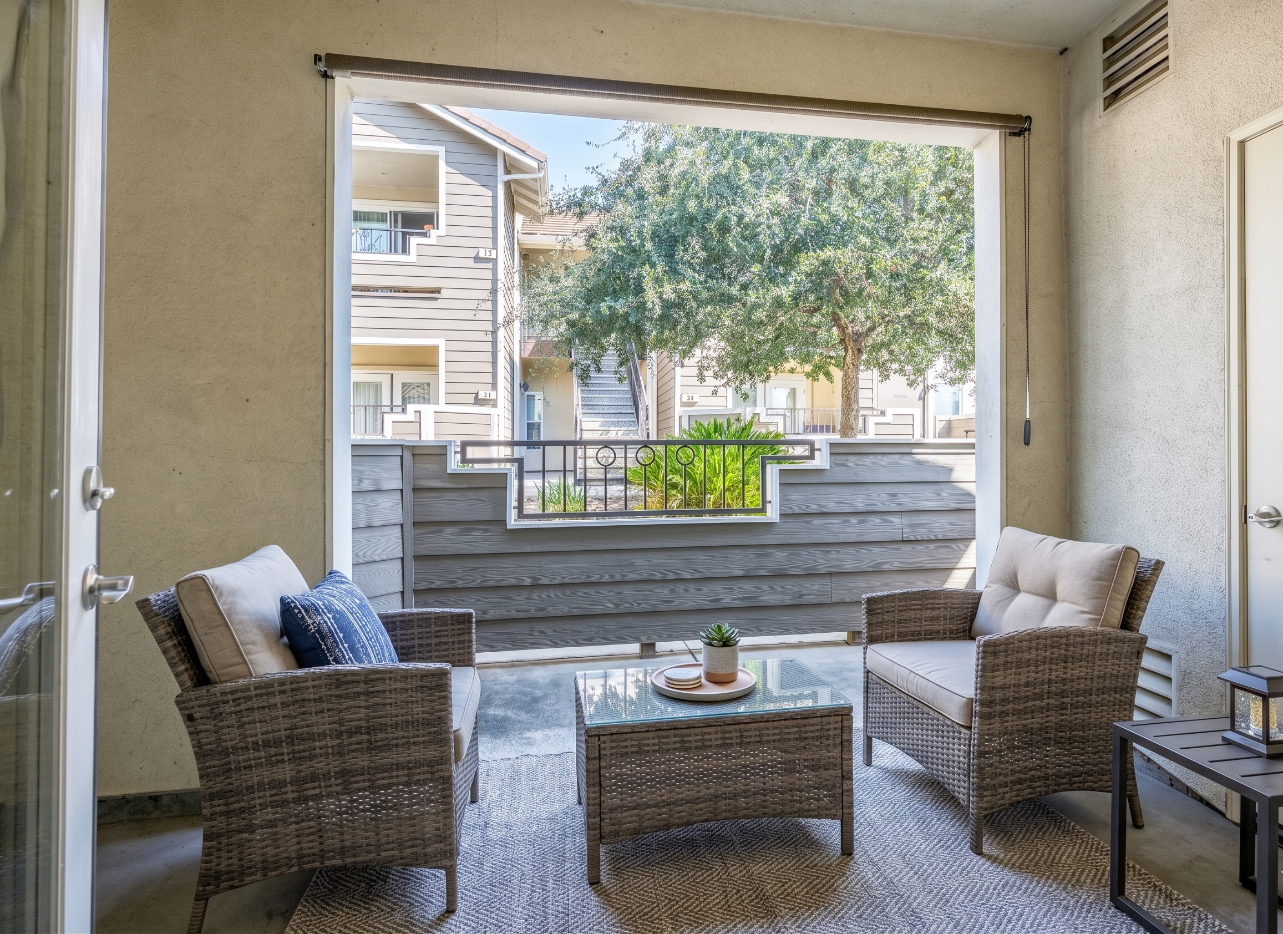Patio with chairs and coffee table