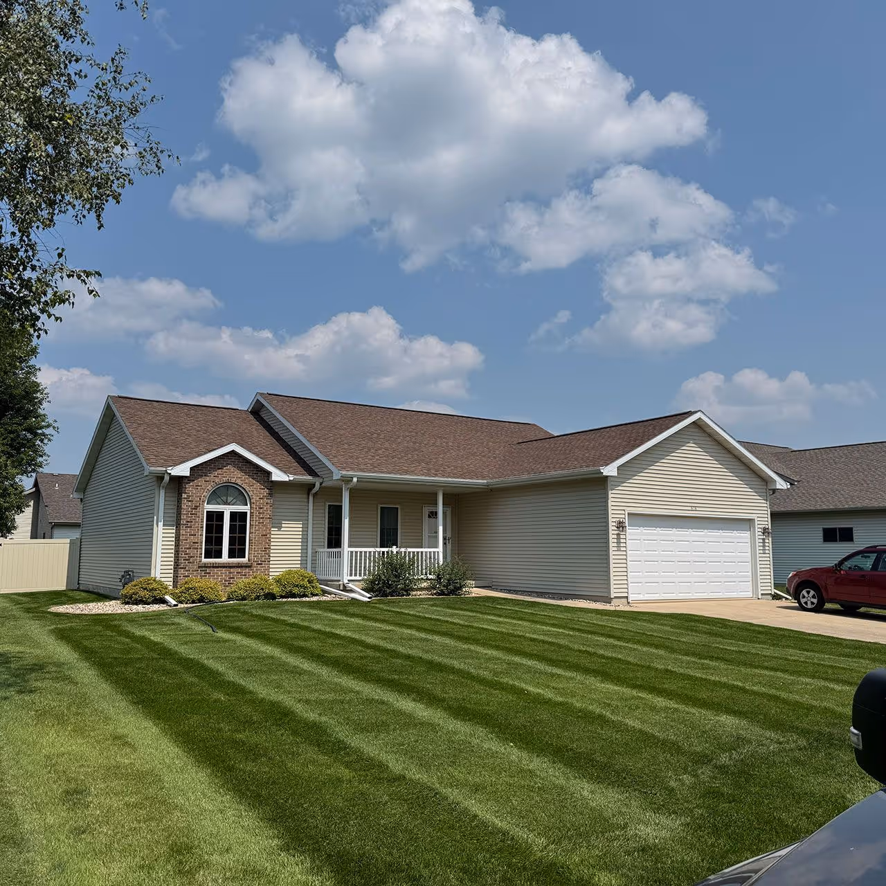 Clean edged lawn and trimmed grass in DeForest Wisconsin landscaping service
