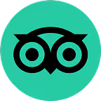 Tripadvisor logo featuring a stylized owl face with two large eyes on a green circular background.