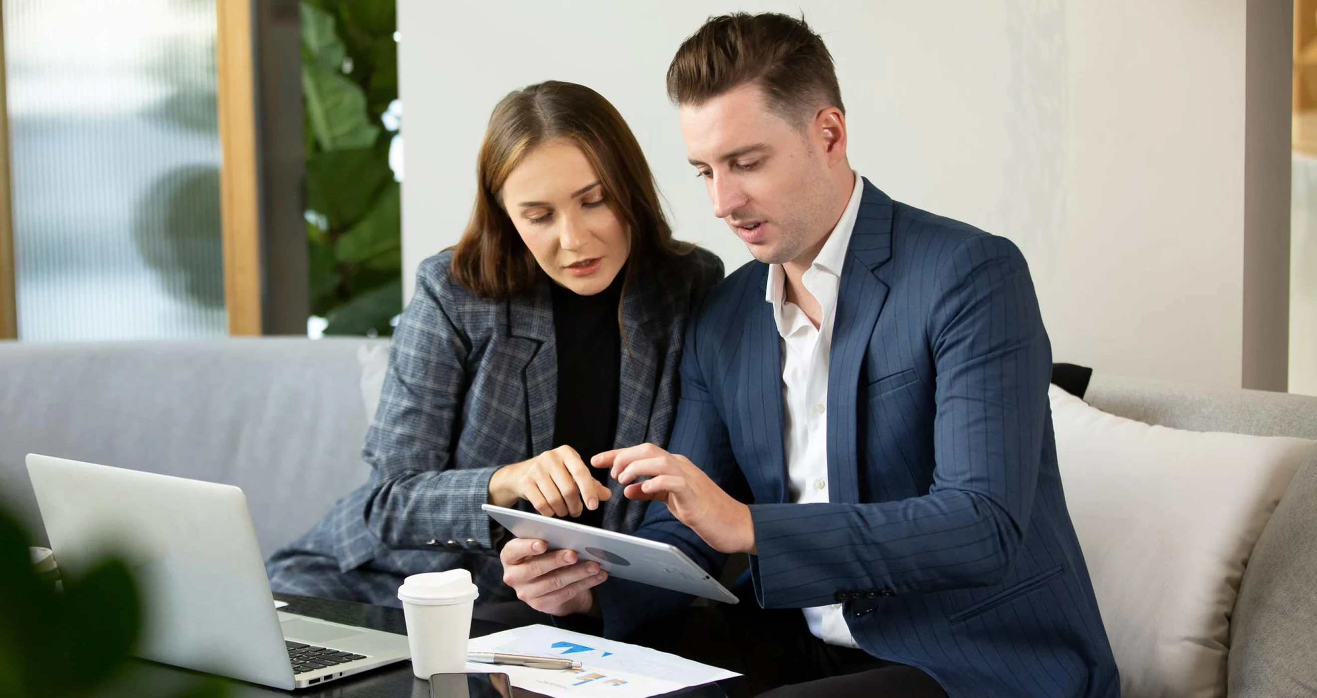 A financial advisor working with a client to plan out her long-term financial goals