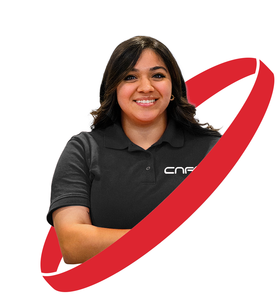 Woman wearing black CNF polo shirt smiling against red swoosh background