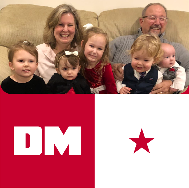 Family photo of Dan Moul with his wife and grandchildren