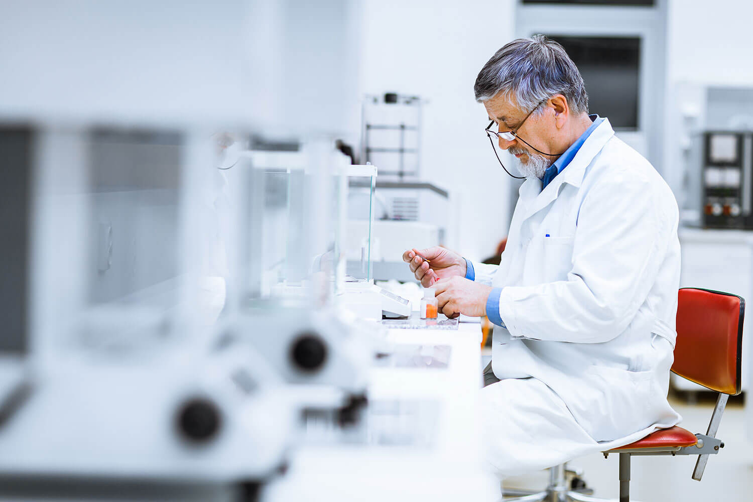 A medical researcher conducting scientific research in a laboratory