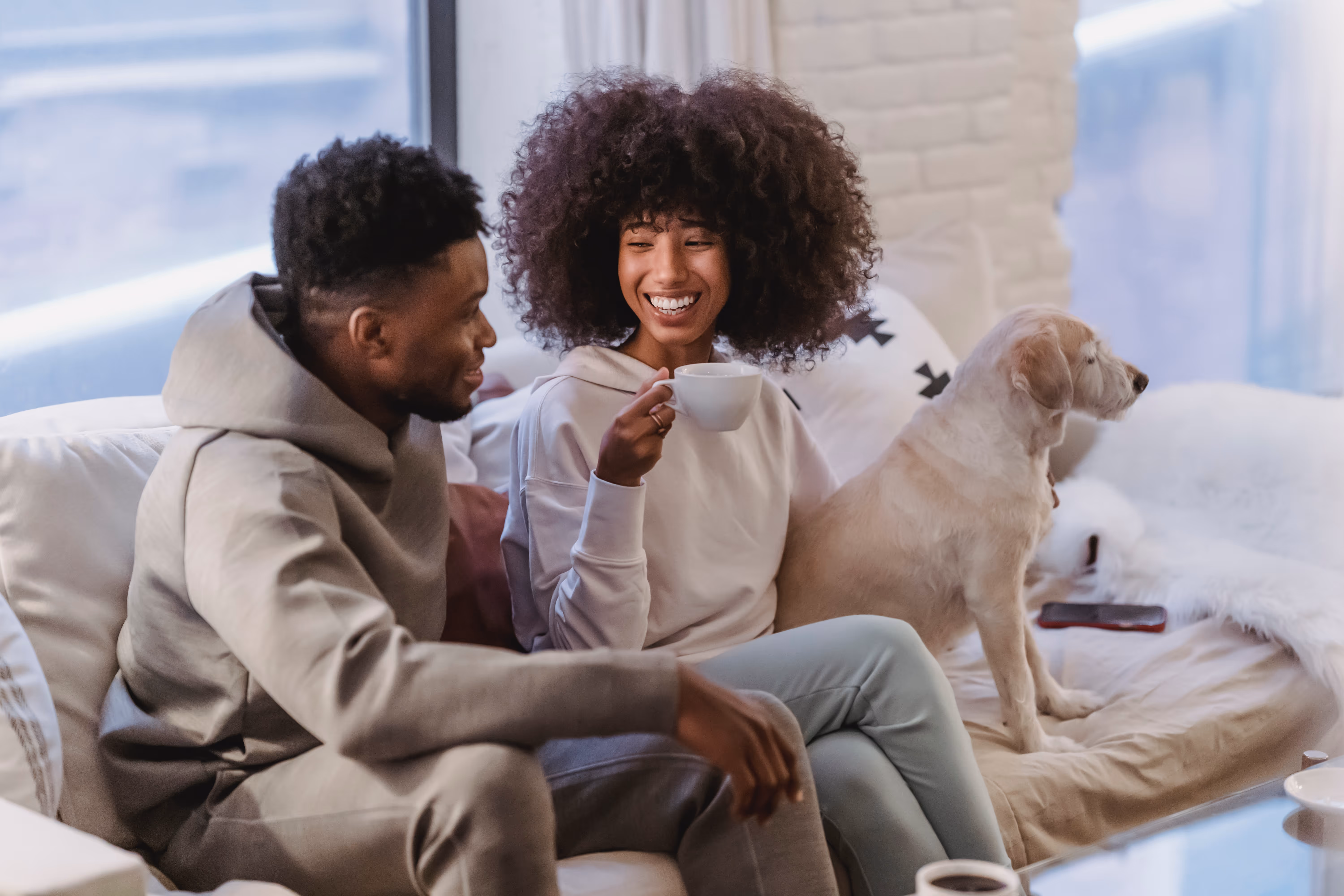 Man and woman with dog