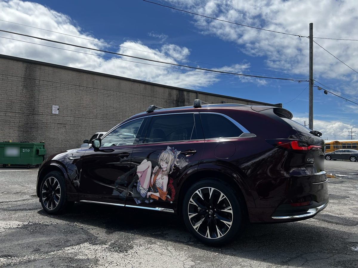 Mazda CX-90 with a printed anime graphic wrapped on the side