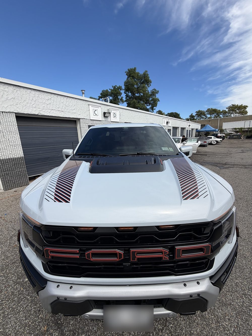 Hood of a Ford Raptor with paint protection film