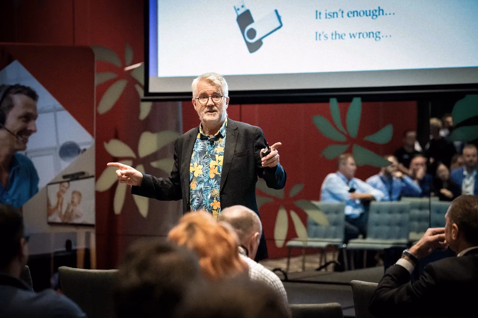 Speaker presenting to an audience at a Brisbane business conference