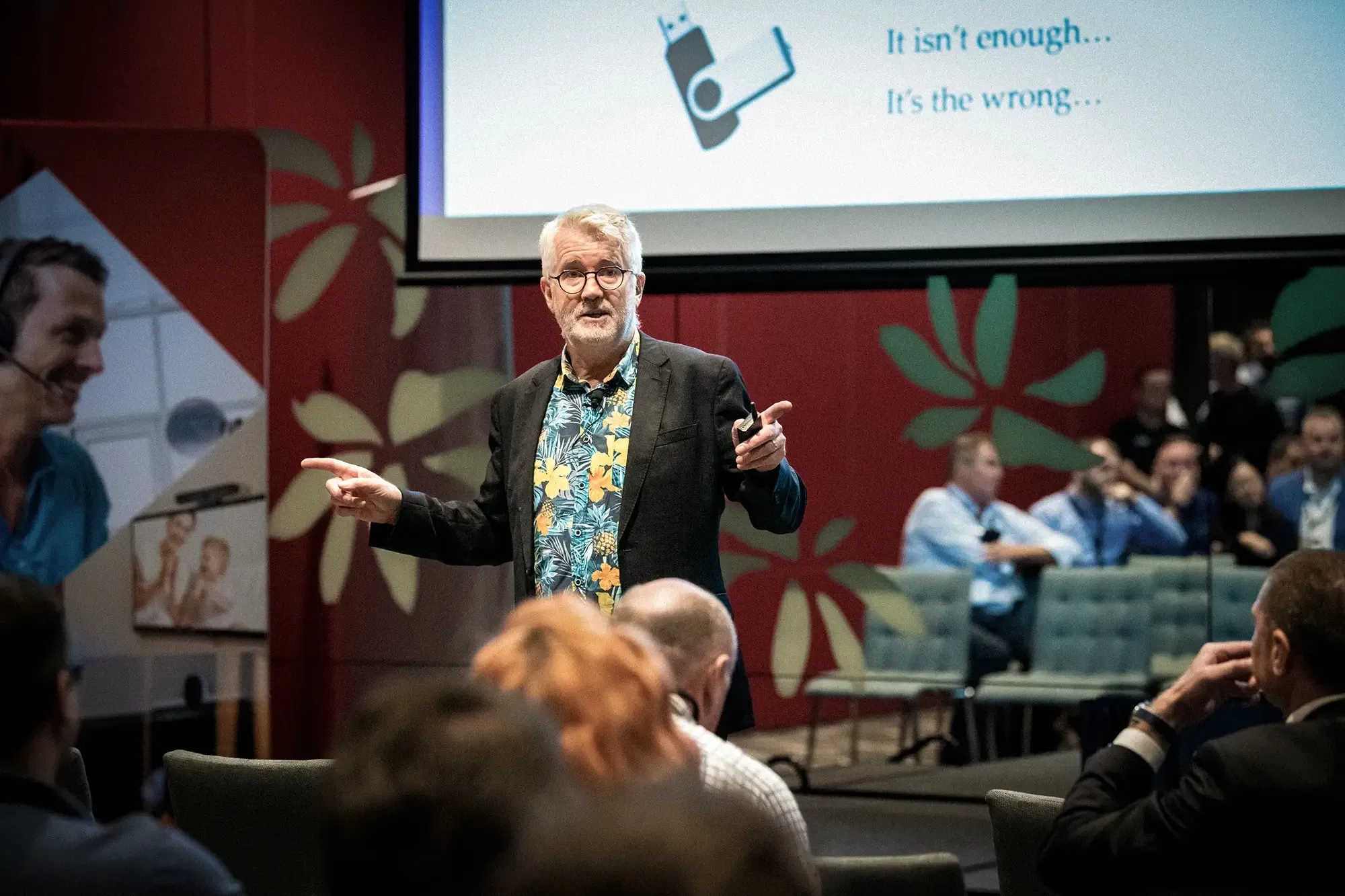 Speaker presenting to an audience at a Brisbane business conference
