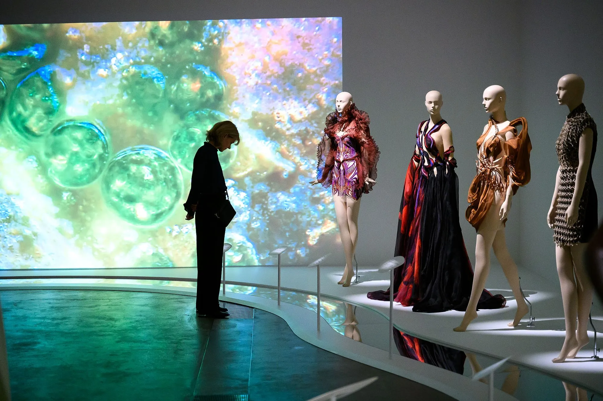 Guests viewing an exhibition during a corporate event in Brisbane