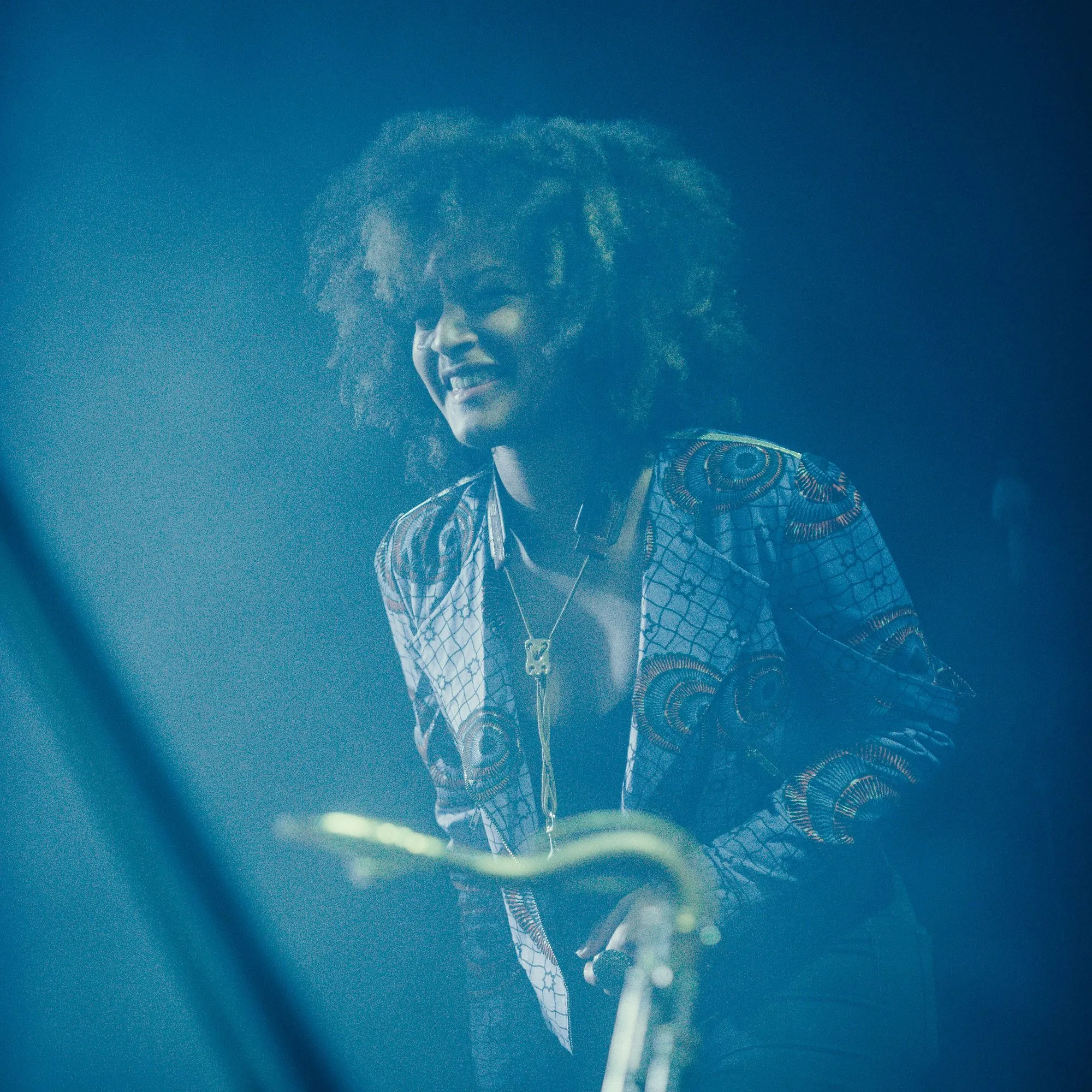 Saxophonist photographed during a live stage performance