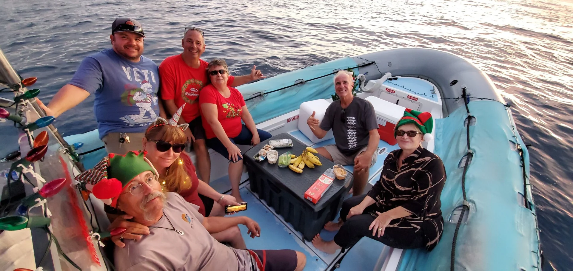 Guests enjoying onboard dining and drinks on a scenic cruise deck Guests enjoying onboard dining and drinks on a scenic cruise deck