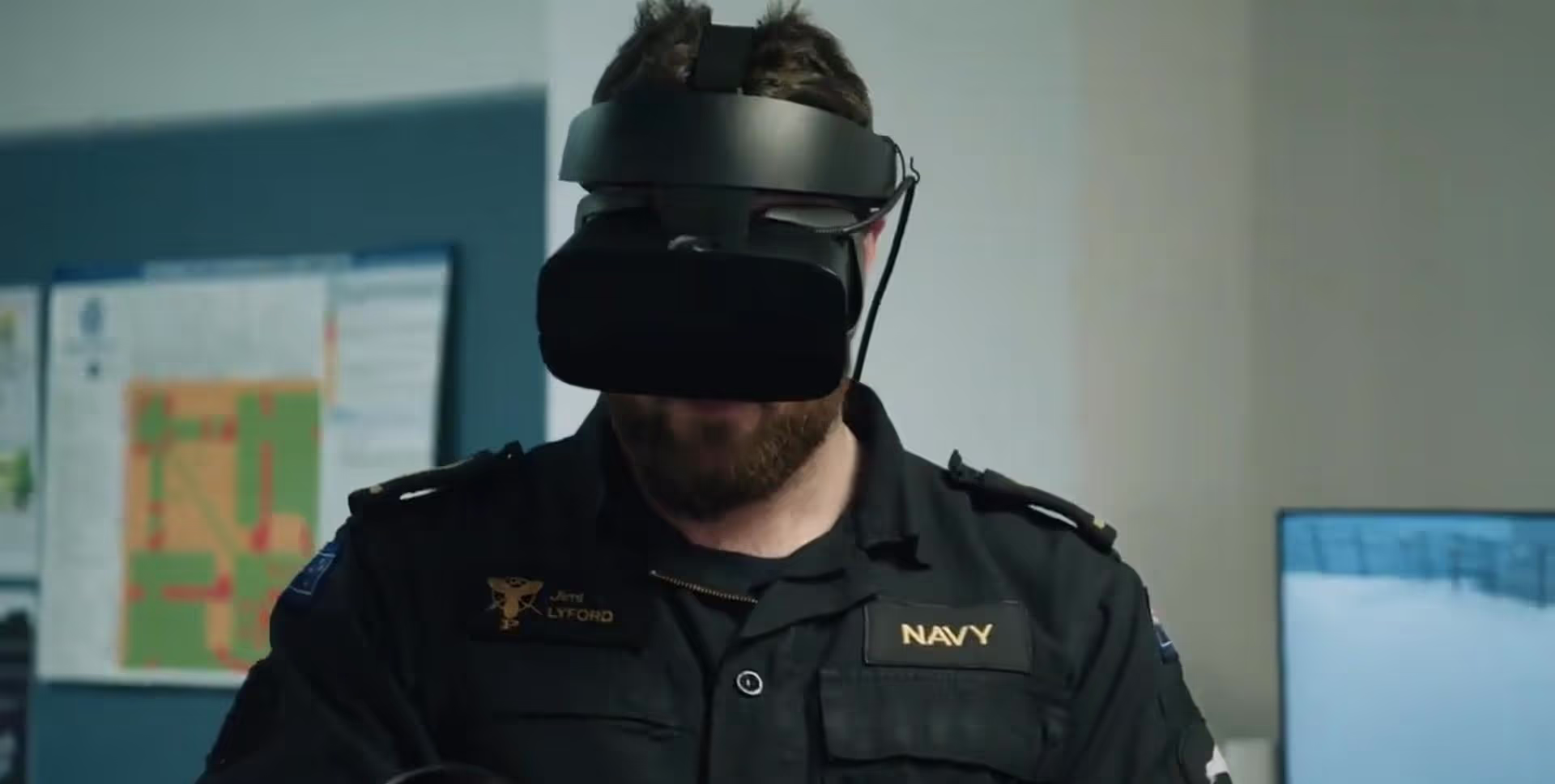 Man in uniform with a VR headset