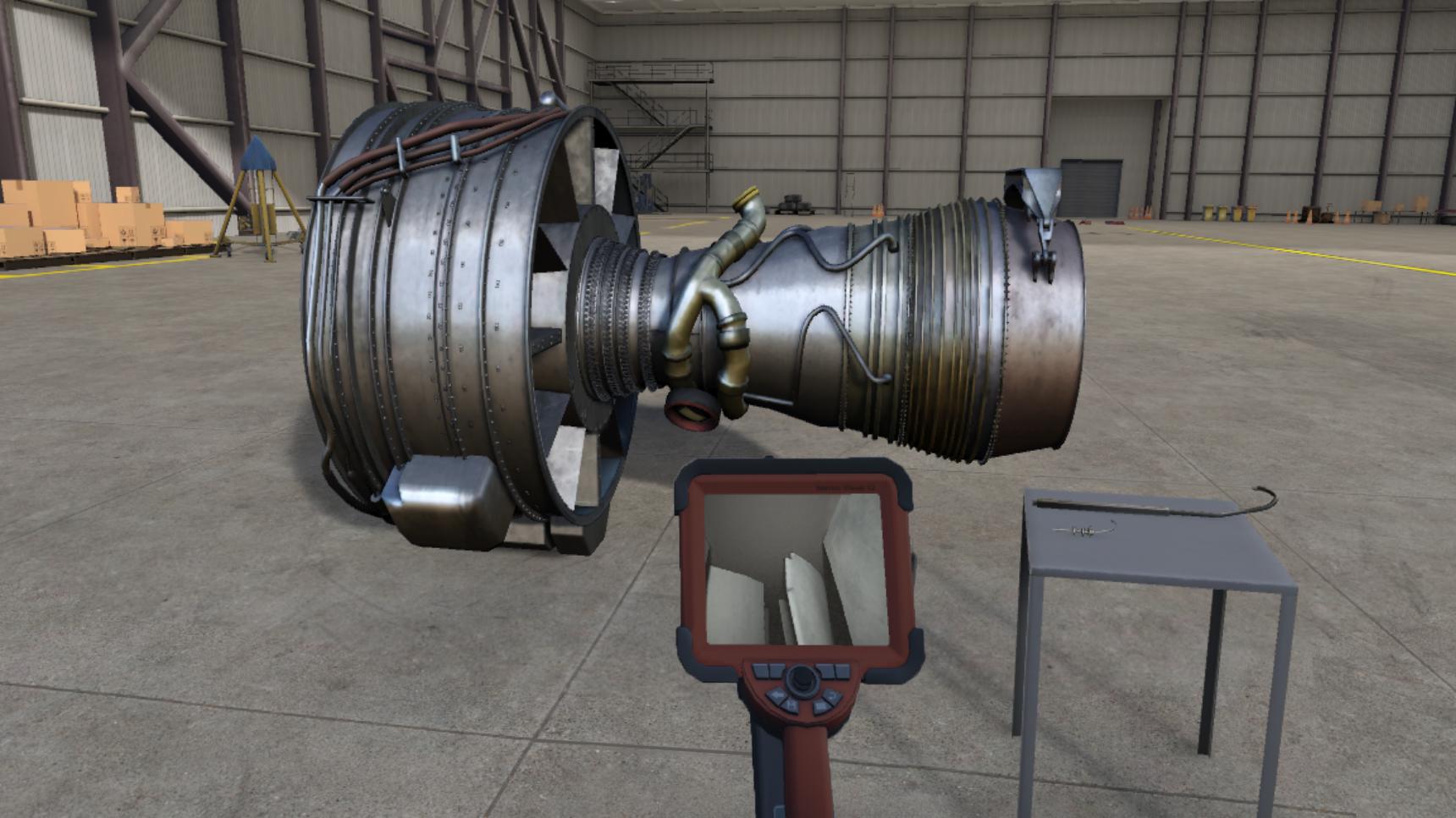 Young man using a boroscope on an aircraft engine